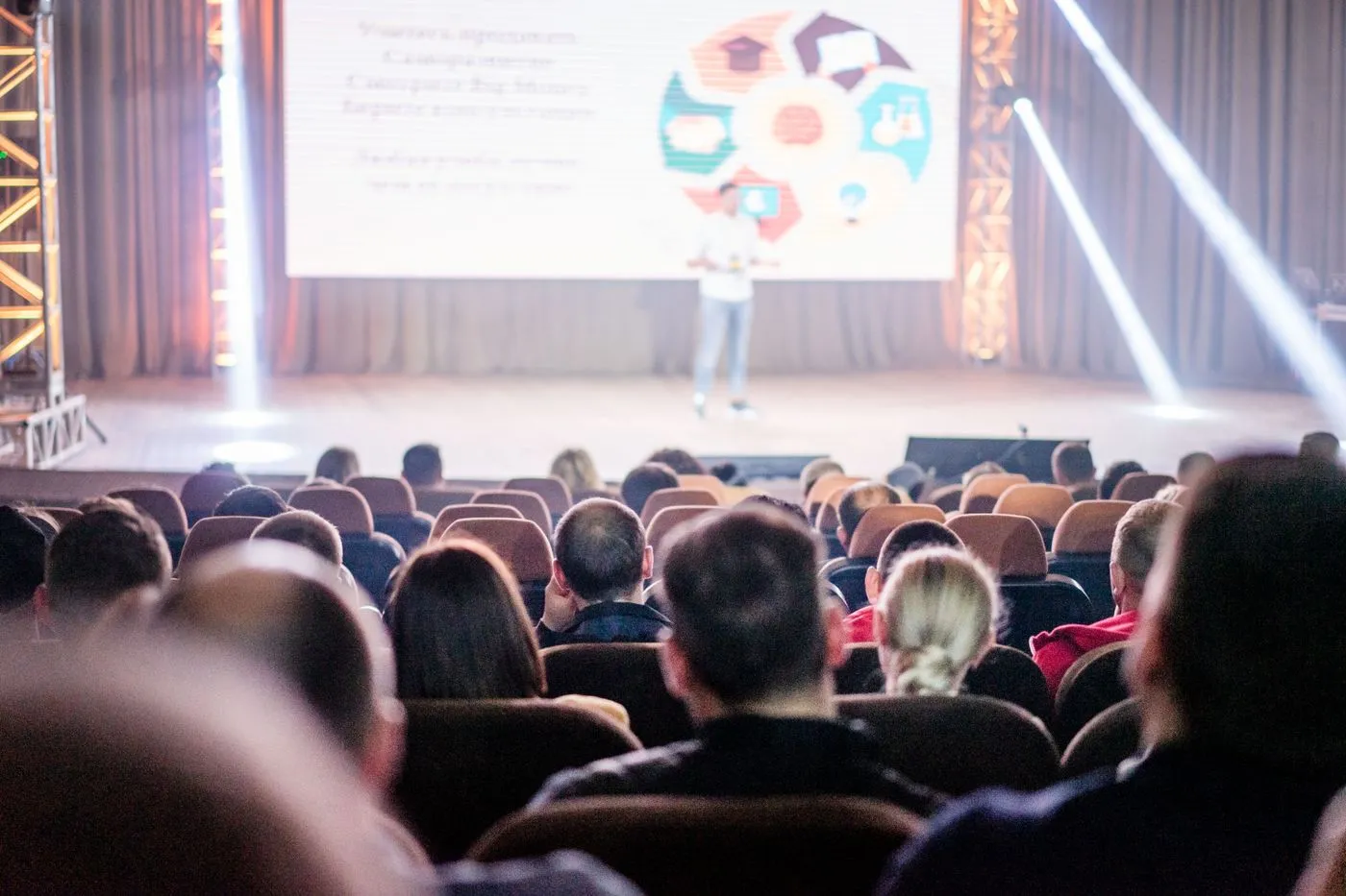 An audience seated at an event presentation